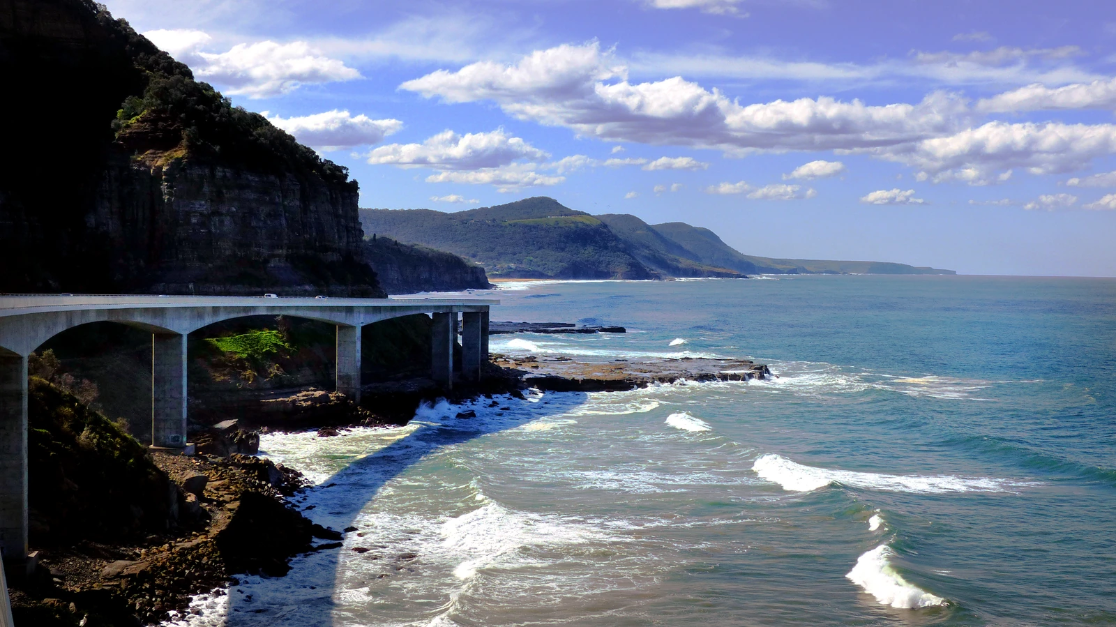 Sea Cliff Bridge winding between the Illawarra escarpment and the ocean